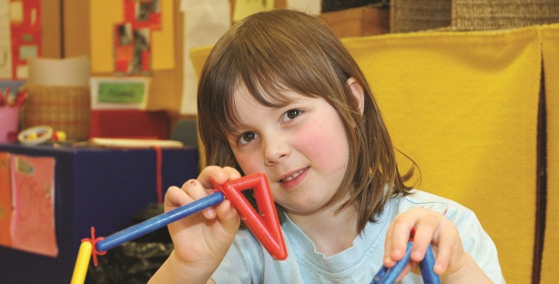 Wiradjuri preschool girl playing with building blocks