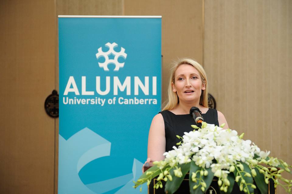 Inga speaking at an Alumni function