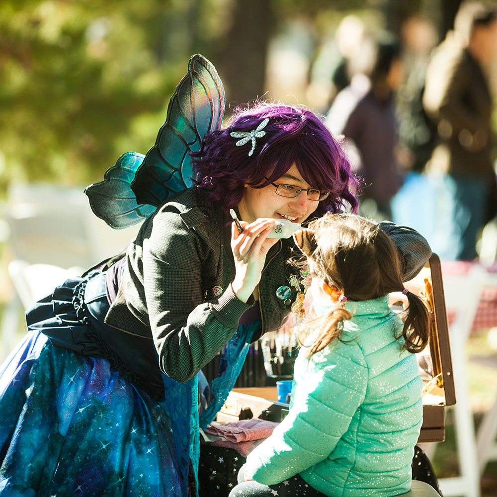 Girl has face painted at Haig Park