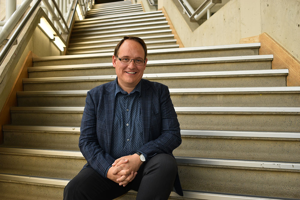Jason Bainbridge on stairs in Building 7