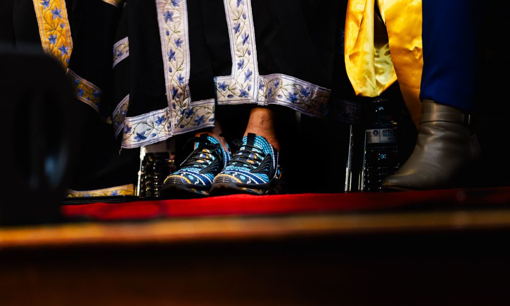 DDesigns sneakers worn by UC Interim VC Lucy Johnston