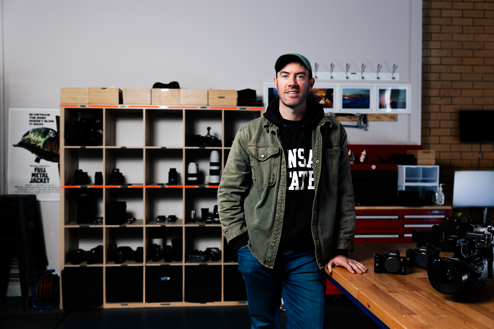 Man standing in front of camera equipment